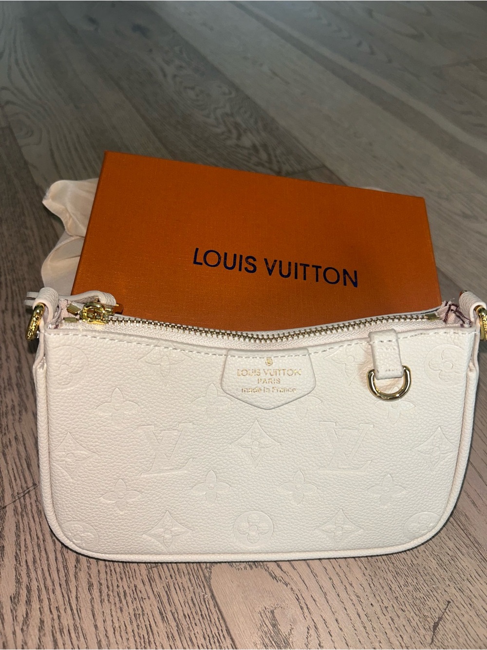 Louis Vuitton Cream Monogram Empreinte Mini Pochette with Gold Hardware
